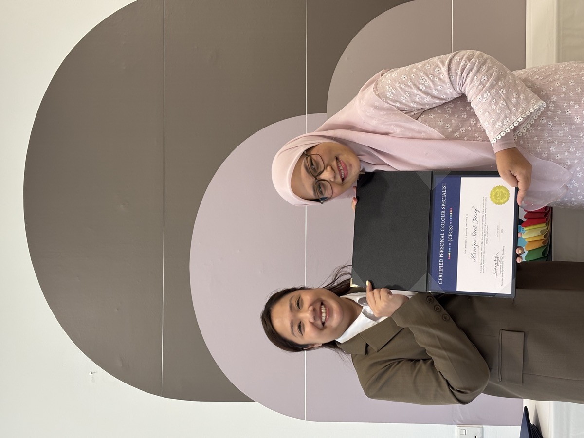 CPCS graduate receiving certificate from Stephenie