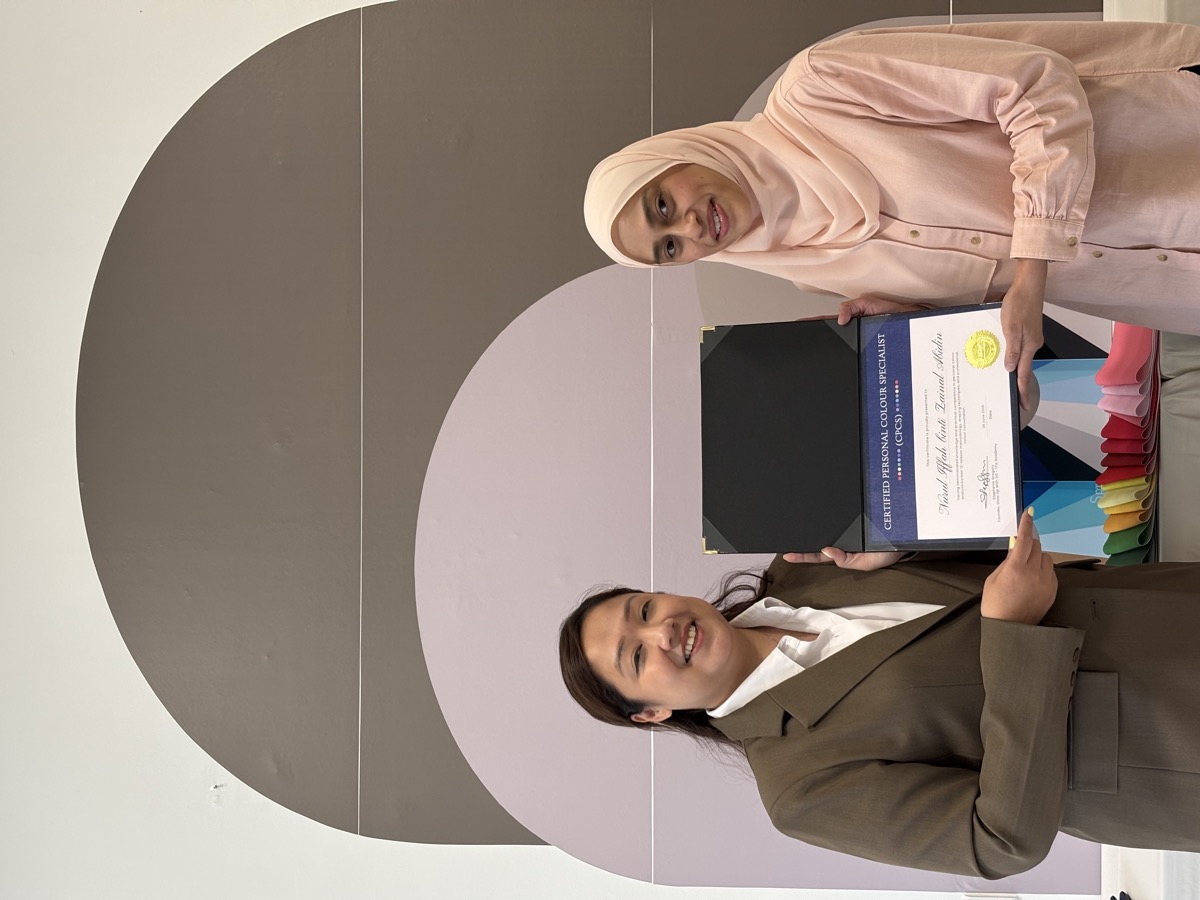 CPCS graduate receiving certificate from Stephenie